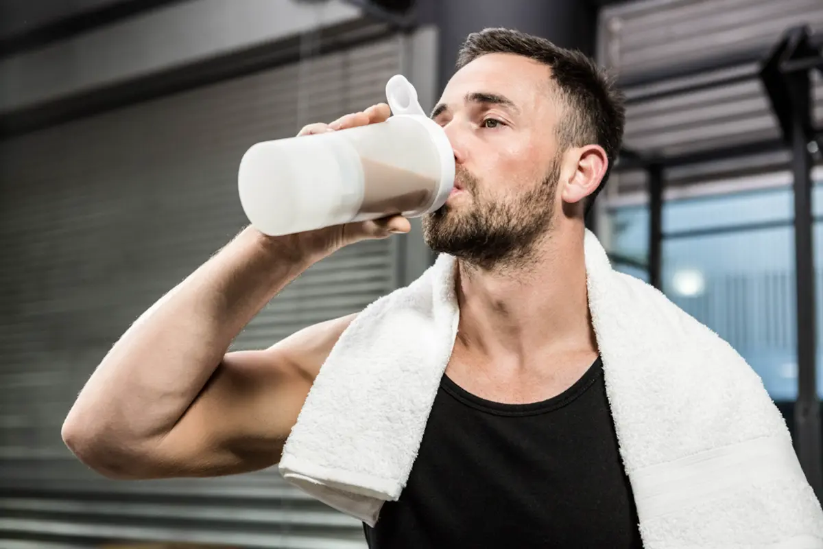 Athlete drinking a protein shake