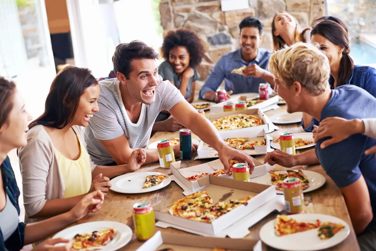 Friends eating pizzas