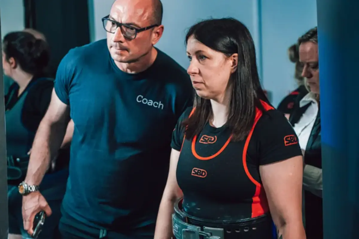 Powerlifting coach and lifter