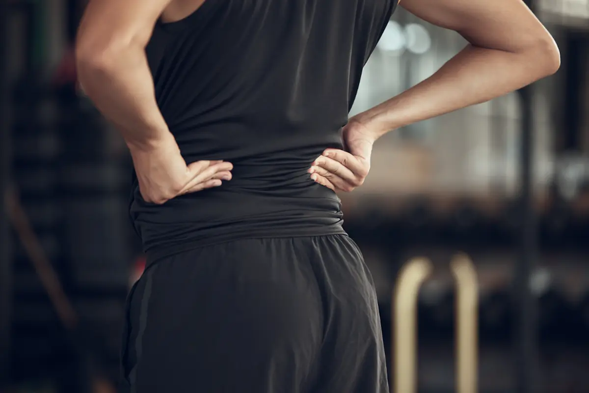 Person with an aching lower back