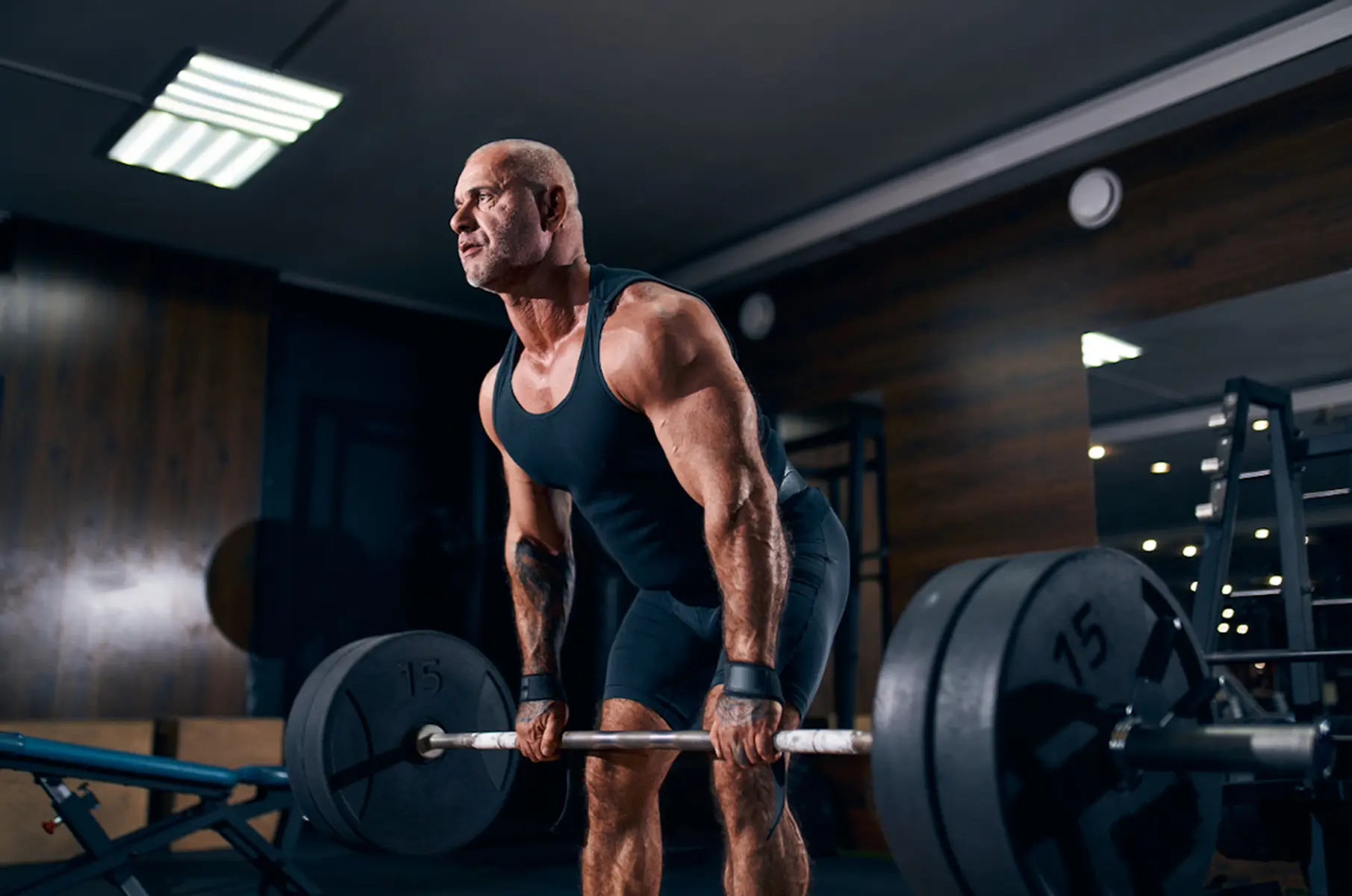 Masters lifter deadlift in the gym