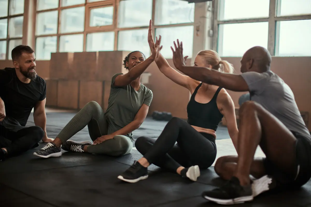 Gym friends doing a hi-five