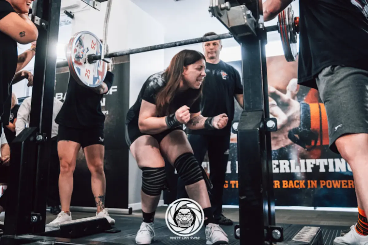 Powerlifter celebrating a competition squat