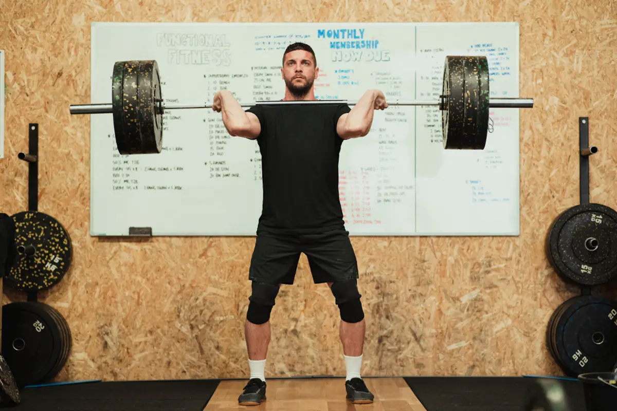 Man performing a barbell front squat